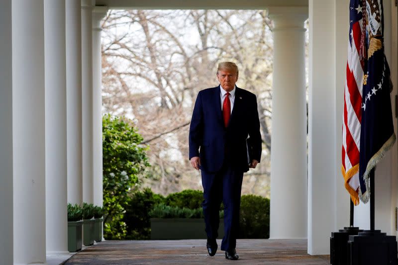 U.S. President Donald Trump arrives during a news conference in the Rose Garden of the White House