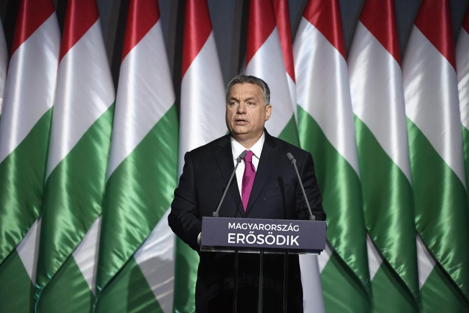 Hungarian Prime Minister Viktor Orban delivers his annual 'State of Hungary' speech in the Varkert Bazar (Castle Gardens Bazaar) at the foot of Castle Hill in Budapest, Hungary, Friday, Feb. 10, 2017. The inscription reads: "Hungary is getting stronger". (Szilard Koszticsak/MTI via AP)