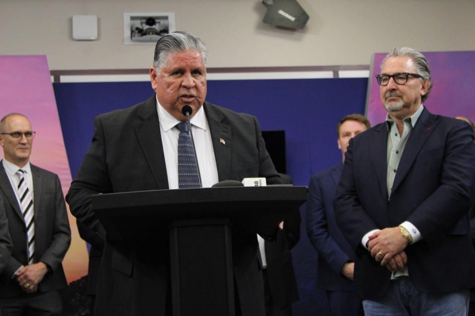 Notes Live CEO J.W. Roth (right) listens as city Rep. Joe Molinar discusses the new Sunset Amphitheater, which will be constructed in his Northeast El Paso district, during a news conference Tuesday, April 23, 2024.