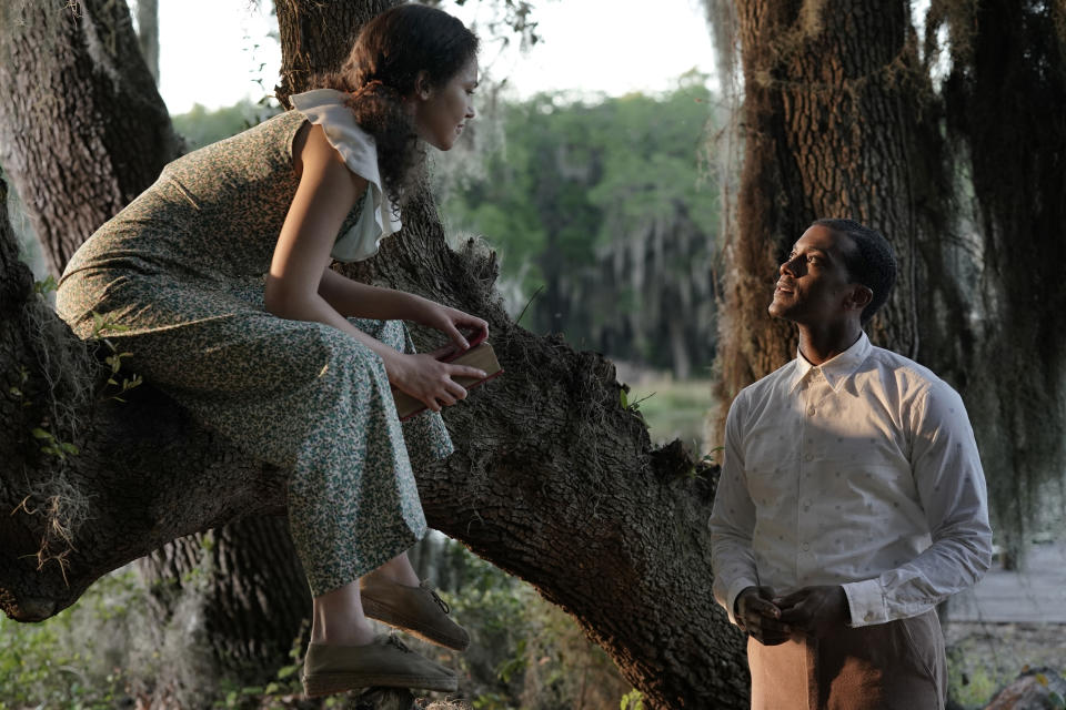 Still from A Jazzman's Blues man and woman sit together in a tree