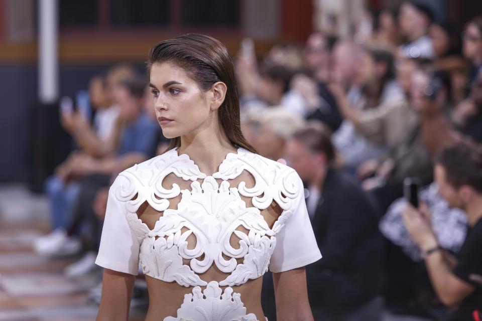 Kaia Gerber wears a creation for the Valentino Spring/Summer 2024 womenswear fashion collection presented Sunday, Oct. 1, 2023 in Paris. (AP Photo/Vianney Le Caer)