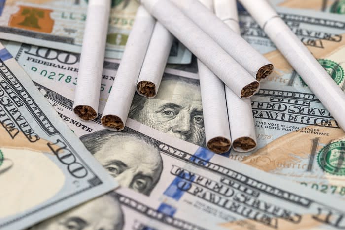 Cigarettes on $100 bills