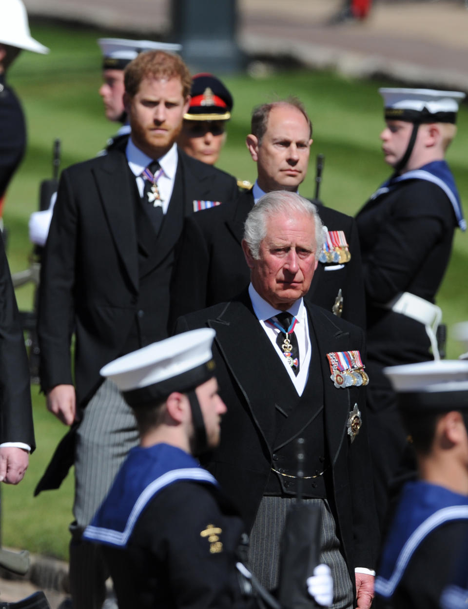 Prince Charles, Prince of Wales and other royal family members walk behind The Duke of Edinburgh’s coffin