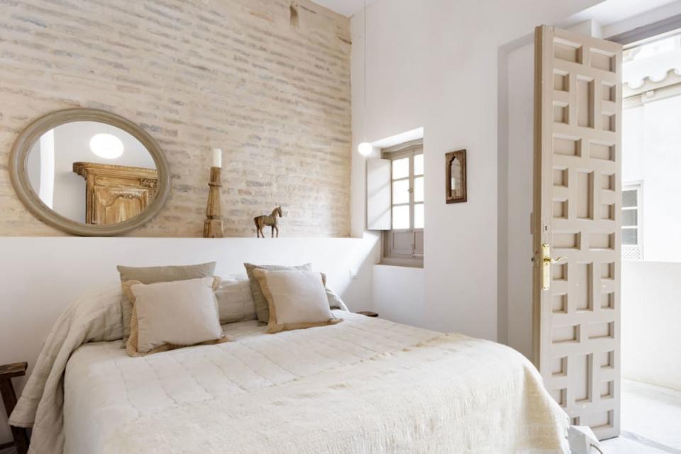 <div class="inline-image__caption"><p>This bedroom—one of the villa’s five—is proof that the most enjoyable dreams come when you are swathed in soothing neutrals. Though we must admit, it’s hard to distinguish between dreams and real life when you’re living it up in Sevilla.</p><p><a href="https://urldefense.proofpoint.com/v2/url?u=https-3A__www.airbnb.com_rooms_plus_19841846-3Fguests-3D1-26adults-3D1-26source-5Fimpression-5Fid-3Dp3-5F1556911830-5F8kTZ9MQvWA2GtqYt&d=DwMFaQ&c=r30hyXAdWe8oret4PlAIyA&r=jtBxEpU3TgpSdJ3yg0L0isIrcR6Y1a8FSqjFnjAPzXpbB4tuwOLn1g8Q7sHGEnyW&m=Hmav48W1H1fcfj4b6aNU1UZbS-mFyTcKvVBcBXXDqqs&s=4f8VPrdDDBbI0zcYOvbAe5SrWDT0PBCJxiLtaihDHvk&e=" rel="nofollow noopener" target="_blank" data-ylk="slk:Rent on Airbnb;elm:context_link;itc:0;sec:content-canvas" class="link "><i>Rent on Airbnb</i></a></p></div> <div class="inline-image__credit">AirBnB</div>