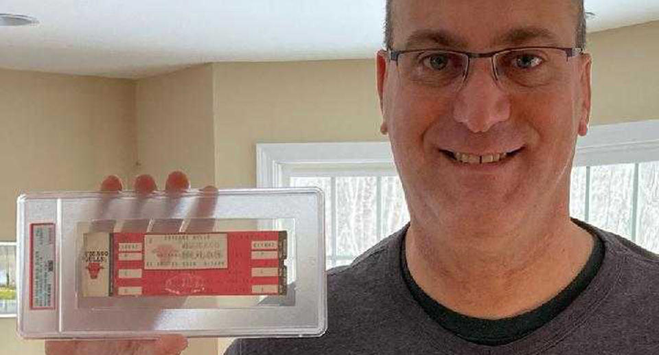 Mike Cole holds the unused ticket to Michael Jordan's debut game in the NBA. (Photo courtesy Mike Cole)