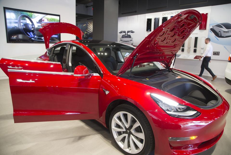 The Tesla Model 3, shown here in Phoenix, Arizona, on Jan. 26, 2018, is among those vehicles recalled by Tesla for an Autosteer update.