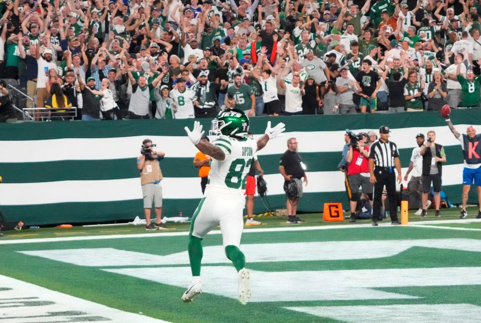 New York Jets wide receiver Xavier Gipson (82) scores a touchdown in overtime on a punt return against the Buffalo Bills at MetLife Stadium.