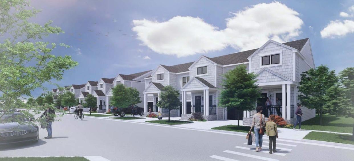 A architectural rendering shows plans for townhome apartments south of the intersection of Hamburg Road and M-36.