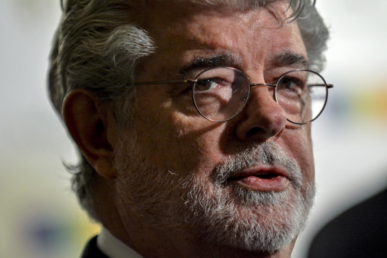 Kennedy Center Honoree and filmmaker George Lucas walks the red carpet before the Kennedy Center Honors at the Kennedy Center in Washington December 6, 2015. REUTERS/James Lawler Duggan