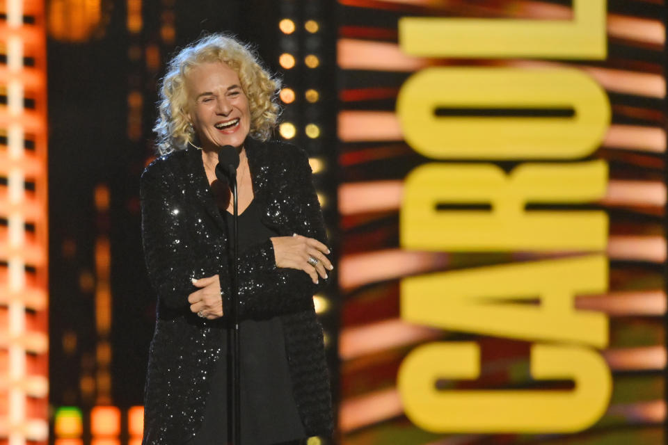 Carole King speaks after being inducted in the performer category during the Rock and Roll Hall of Fame Induction ceremony, Saturday, Oct. 30, 2021, in Cleveland. (AP Photo/David Richard) - Credit: AP