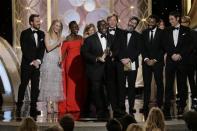 British director Steve McQueen celebrates after winning Best Motion Picture, Drama, for "12 Years a Slave" at the 71st annual Golden Globe Awards in Beverly Hills, California January 12, 2014. REUTERS/Paul Drinkwater/NBCUniversal