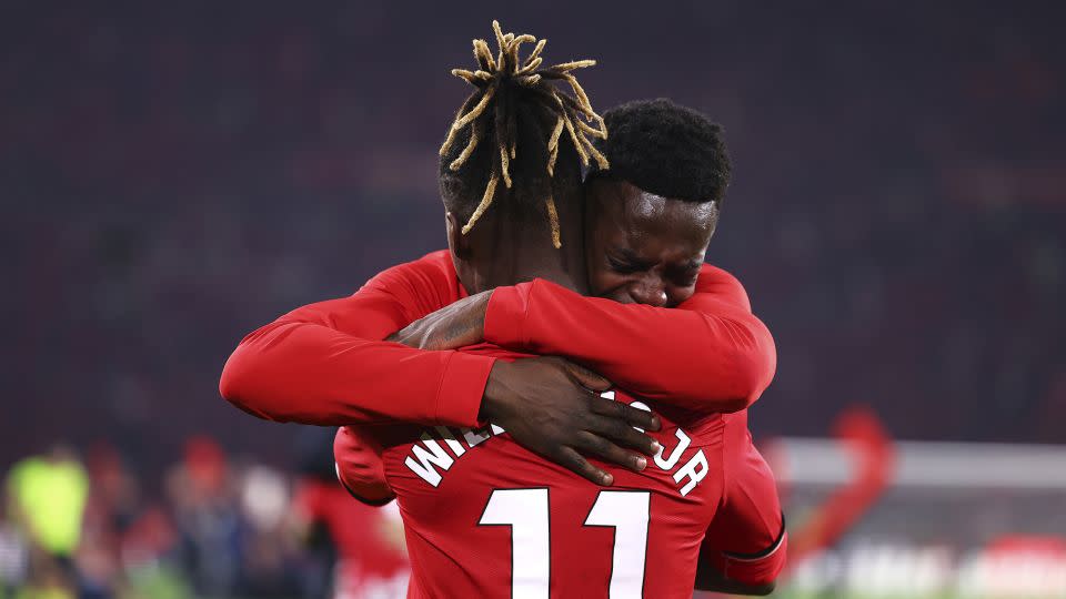 Iñaki Williams and Nico Wiliams embrace after the winning penalty shootout. - Fran Santiago/Getty Images