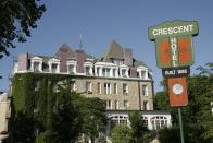 <p>Located in Eureka Springs, Arkansas, the <a href="https://crescent-hotel.com/" rel="nofollow noopener" target="_blank" data-ylk="slk:Crescent Hotel;elm:context_link;itc:0;sec:content-canvas" class="link ">Crescent Hotel</a> is said to be an extremely haunted spot in America that may even have a <a href="http://crescent-hotel.com/blog/tag/americas-most-haunted-hotel/" rel="nofollow noopener" target="_blank" data-ylk="slk:portal to the "other side.";elm:context_link;itc:0;sec:content-canvas" class="link ">portal to the "other side."</a> Legend says radio personality and inventor Norman G. Baker bought it in 1937 and used it as a hospital to treat cancer patients... even though he had no training. Naturally, people allegedly died. Visitors have reported seeing the ghosts of Baker’s patients and of Morris, a cat that used to live in the hotel and is buried behind it.</p>