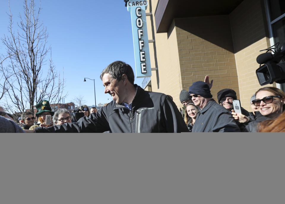 Democratic presidential candidate Beto O'Rourke greets a crowd outside Cargo Coffee on East Washington Avenue during a stop in Madison, Wis., Sunday, March 17, 2019. (AP Photo/Wisconsin State Journal, Amber Arnold)/Wisconsin State Journal via AP)