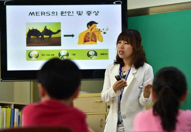 South Korean students attend a special class on MERS virus, at an elementary school in Seoul, on June 3, 2015