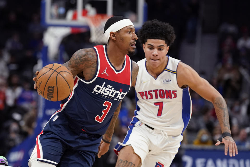 Washington Wizards guard Bradley Beal (3) drives as Detroit Pistons guard Killian Hayes (7) defends during the first half of an NBA basketball game, Wednesday, Dec. 8, 2021, in Detroit. (AP Photo/Carlos Osorio)