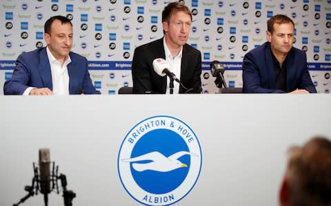 Brighton & Hove Albion chairman Tony Bloom with new manager Graham Potter and technical director Dan Ashworth during the press conference - Credit: REUTERS