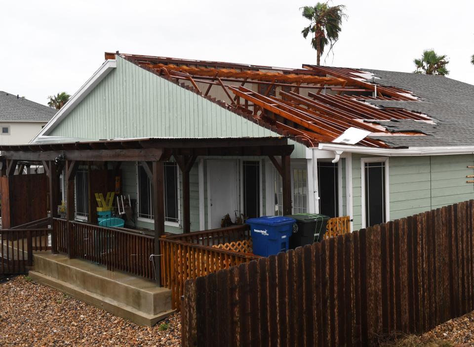 A house suffers roof damage in Corpus Christi.&nbsp;