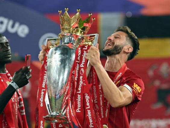 Adam Lallana has left Liverpool to join Brighton on a three-year deal (PA)