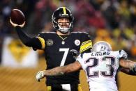 Dec 17, 2017; Pittsburgh, PA, USA; Pittsburgh Steelers quarterback Ben Roethlisberger (7) passes against pressure rom New England Patriots strong safety Patrick Chung (23) during the fourth quarter at Heinz Field. The Patriots won 27-24. Mandatory Credit: Charles LeClaire-USA TODAY Sports