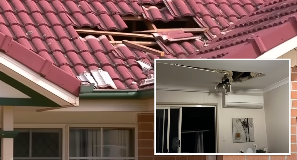 The roof and interior ceiling is seen damaged here after the police stand-off in Keperra. 