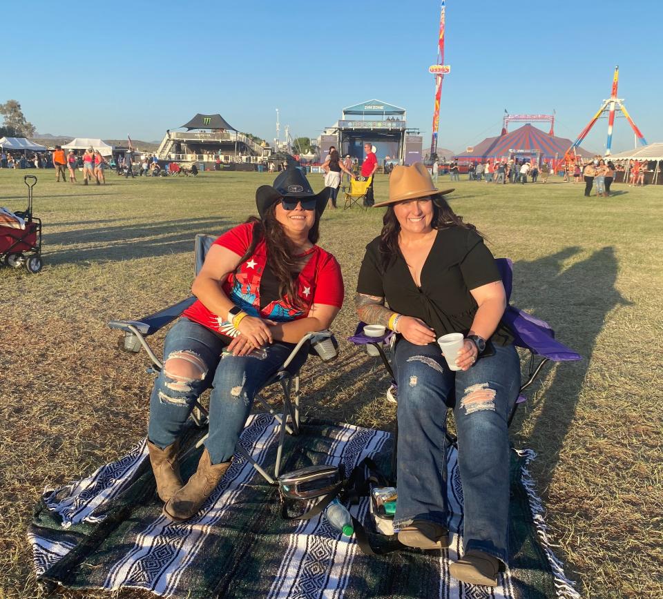 Brittany Keathley (right) and Randee Ballas, who have been friends for six years, came to Country Thunder with no particular artist in mind who they were excited to see. So far, Randall King has been their favorite.