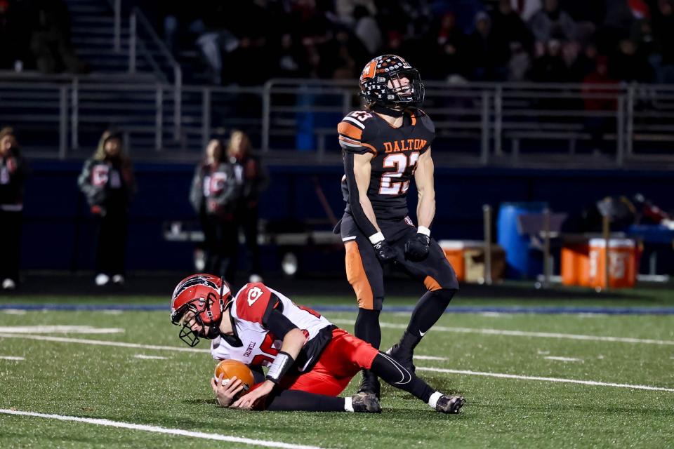 Grayson Siders celebrates a sack against Caldwell.