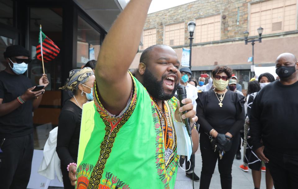 Westchester County Legislator Christopher Johnson speaks to a group of protesters in Yonkers' Getty Square on June 2, 2020.