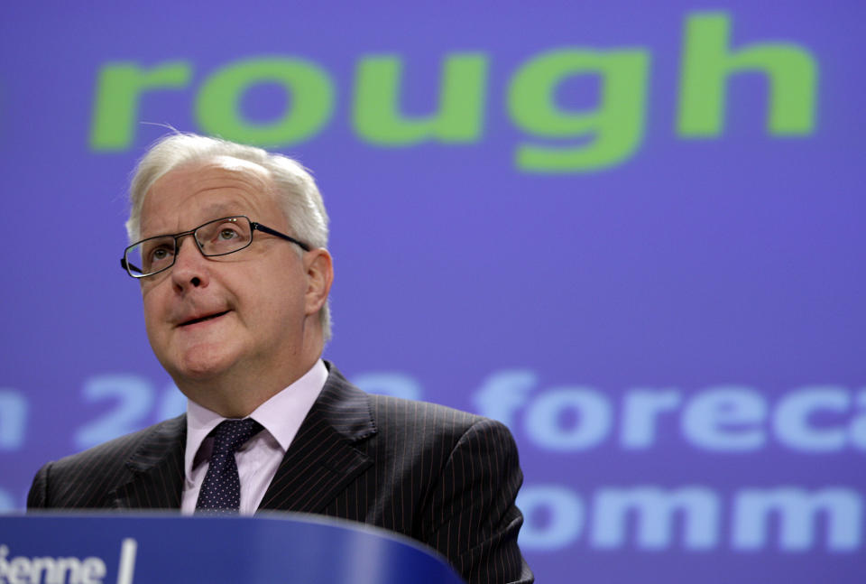 European Commissioner for Economic and Monetary Affairs Olli Rehn speaks during the presentation of the Fall Economic Forecast at EU headquarters in Brussels on Wednesday, Nov. 7, 2102. Europe's economy is still reeling and unemployment could remain high for years in spite of the progress made in solving the debt crisis, the European Union warned Wednesday as it downgraded its forecasts for the 27-country bloc. (AP Photo/Virginia Mayo)