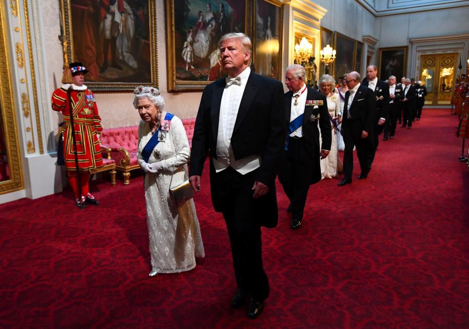 <p>Trump and the Queen enter the banquet together through Buckingham Palace's East Gallery.</p>