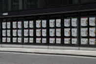 A closed branch of the sushi restaurant chain Itsu at Holborn in the City of London, Thursday, April 1, 2021. When the coronavirus struck, nearly 540,000 workers vanished almost overnight from the business hub, known as the City of London, or simply "the City." A year on, most haven't returned.(AP Photo/Alastair Grant)