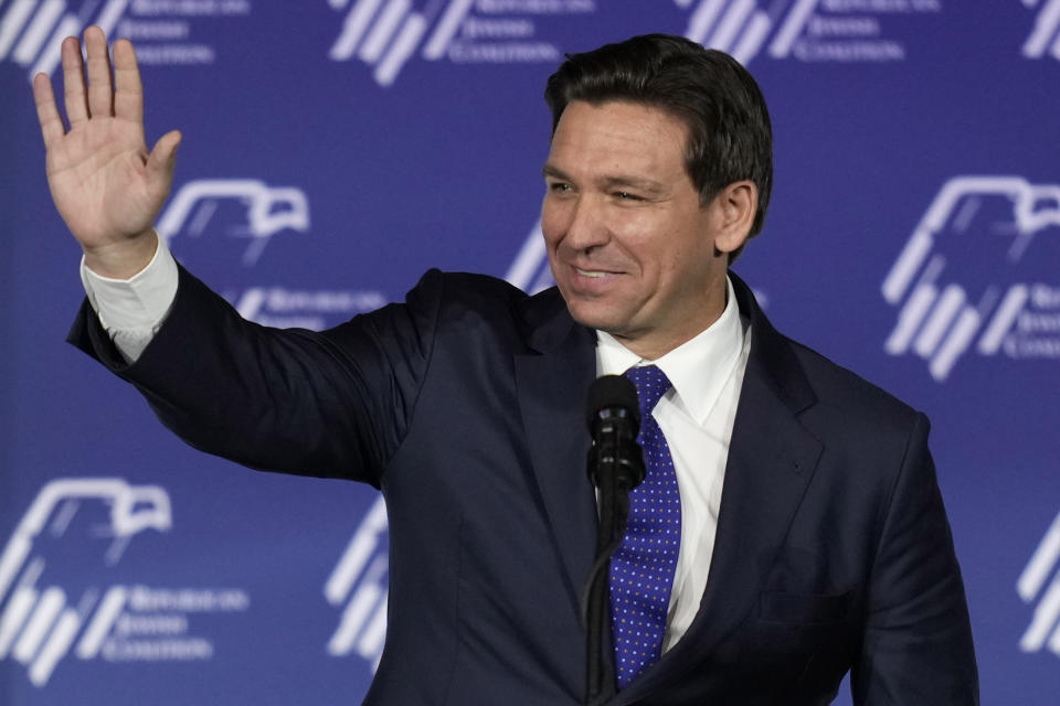 Republican presidential candidate Florida Gov. Ron DeSantis waves to the crowd during an annual leadership meeting of the Republican Jewish Coalition, Saturday, Oct. 28, 2023, in Las Vegas. (AP Photo/John Locher)