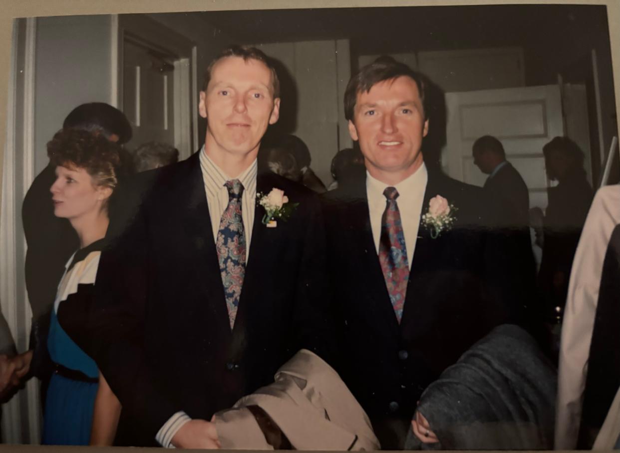 Tom Donahue, left, and his brother Mike, right, both worked as paper carriers as kids for the T&G.