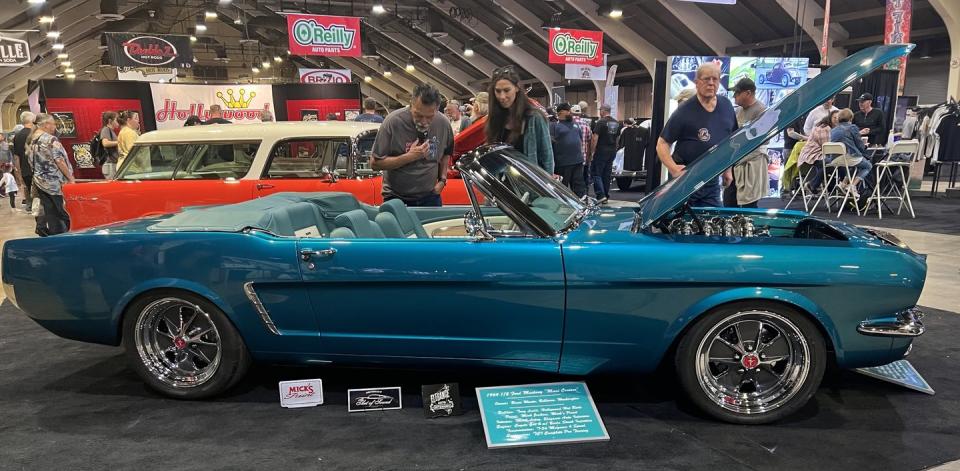 <p>An AMBR winner back in 2017 with his Packard roadster, Troy Ladd of Hollywood Hot Rods displayed this gorgeously detailed 1964½ Mustang powered by a late model Coyote DOHC engine. As the generations pass, pre-war body styles are less, well, relatable, This is nth degree street rod style detail applied to a relatively new Mustang… only 58½ years old.</p>