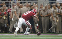 Arkansas linebacker De'Jon Harris (8) picks up a Texas A&M fumble before taking the ball into the end zone for a touchdown during the first half of an NCAA college football game Saturday, Sept. 28, 2019, in Arlington, Texas. (AP Photo/Ron Jenkins)