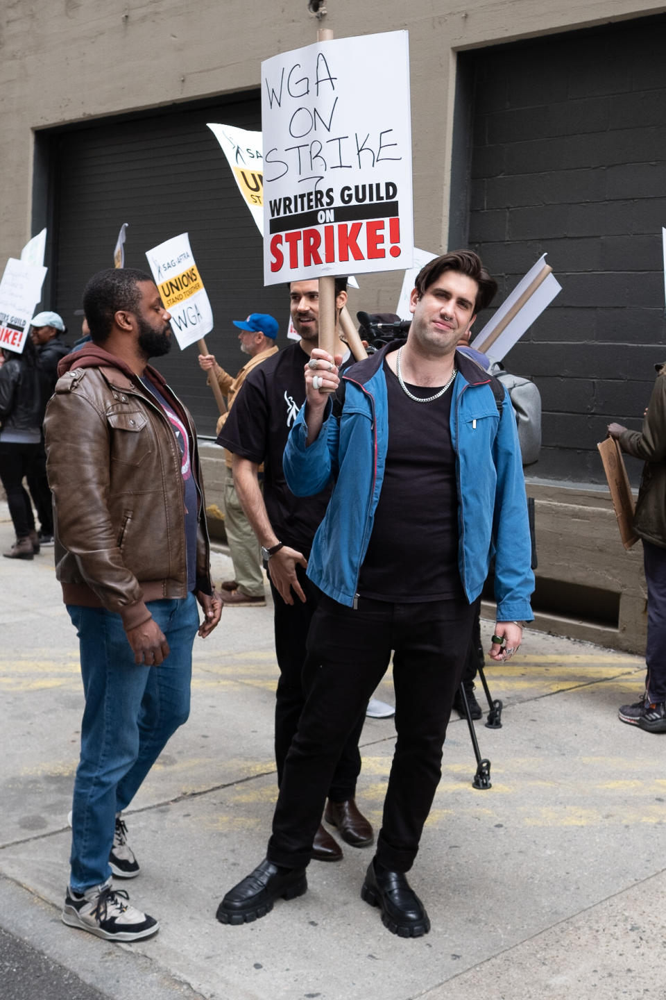 man standing at WGA strike