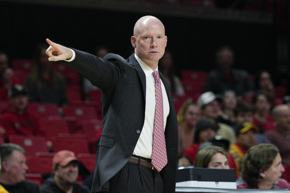 Maryland coach Kevin Willard points to players during the first half of the team's NCAA college basketball game against UMBC, Thursday, Dec. 29, 2022, in College Park, Md. (AP Photo/Jess Rapfogel)