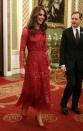 <p>Kate wore a sparkly red dress to a Buckingham Palace reception, held to celebrate the UK-Africa Investment Summit.</p>