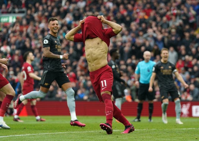 Arsenal defender Ben White, left, delights in Mohamed Salah's penalty miss during the 2-2 draw with Liverpool at Anfield in April. Salah's failure from the spot was his second in as many months during an inconsistent season for Jurgen Klopp's Reds. However, the Gunners did not have the last laugh. Their surrender of a two-goal lead on a pulsating afternoon on Merseyside marked the start of the decline which extinguished their title hopes