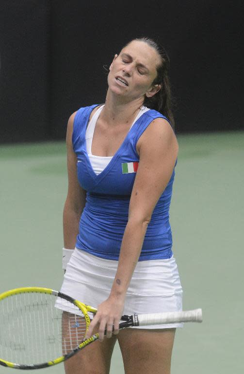 Italy's Roberta Vinci reacts during her Fed Cup semi-final match against Czech Republic's Petra Kvitova on April 20, 2014 in Ostrava