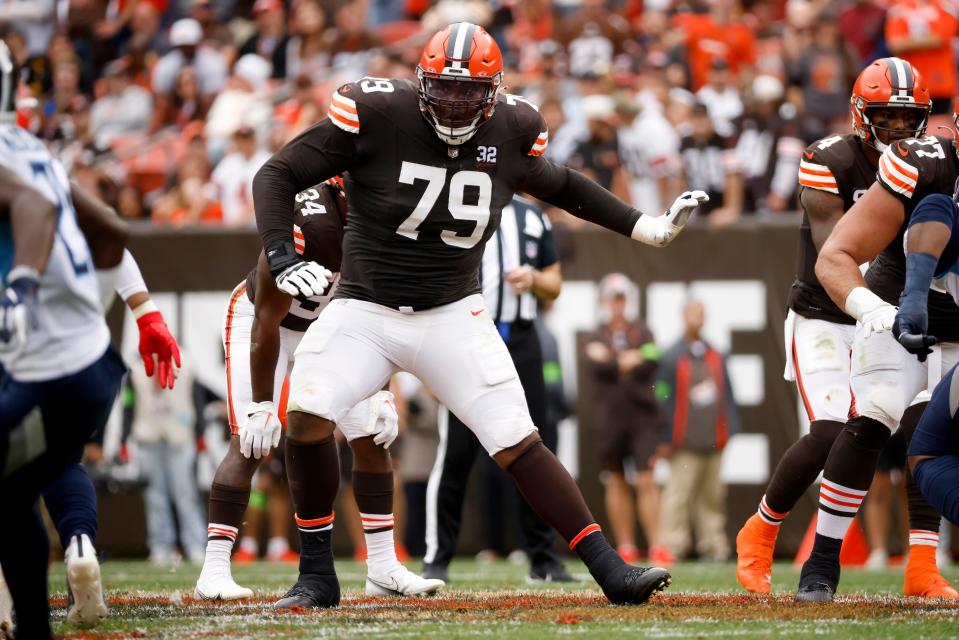 Browns offensive tackle Dawand Jones looks to make a block against the Titans, Sunday, Sep. 24, 2023, in Cleveland.