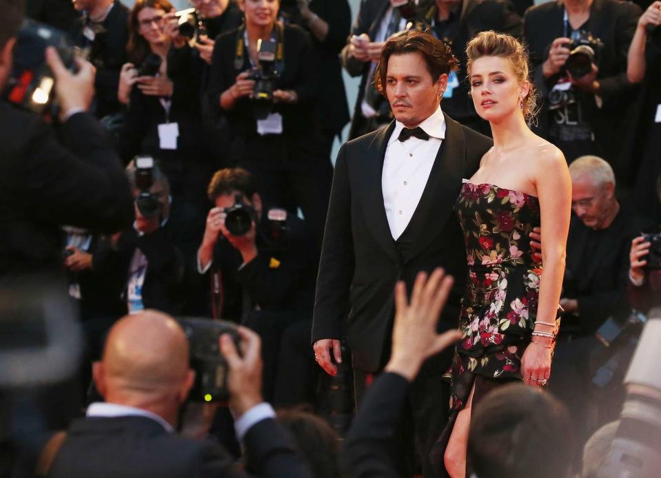 Johnny Depp and actress Amber Heard attend a premiere for 'The Danish Girl' during the 72nd Venice Film Festival in Venice, Italy.