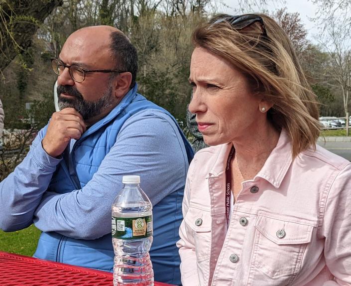 Scarsdale school board President Karen Ceske and trustee James Dugan listened Scarsdale residents at the board's &quot;coffee&quot; outside Scarsdale High on April 21, 2022.