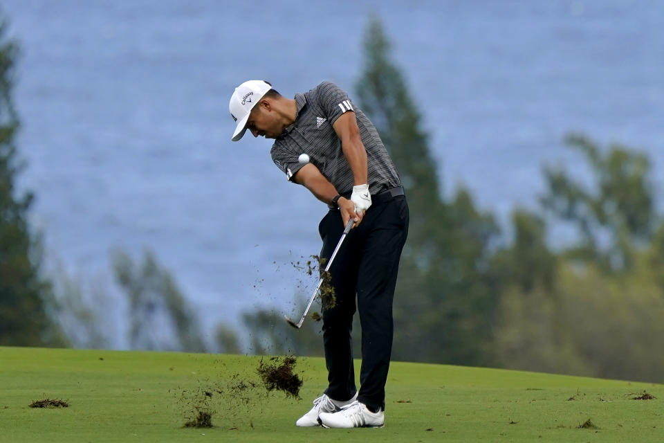 Xander Schauffele hits from the fourth fairway during third round of the Tournament of Champions golf event, Saturday, Jan. 4, 2020, at Kapalua Plantation Course in Kapalua, Hawaii. (AP Photo/Matt York)