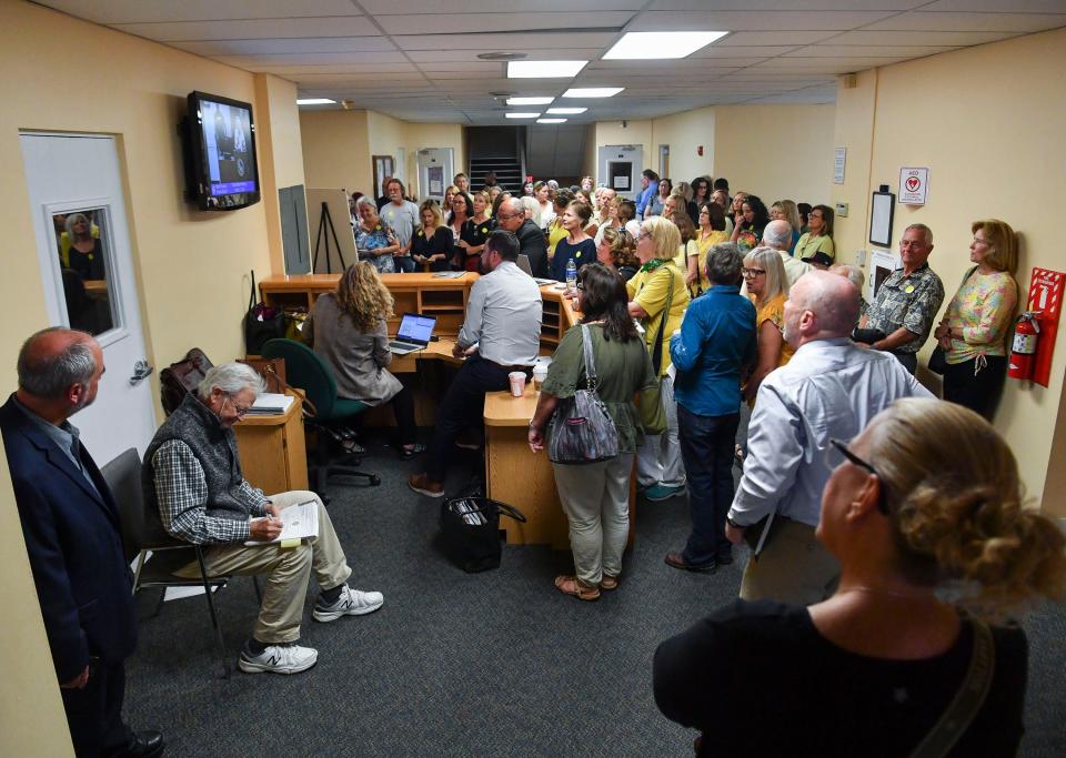 Residents concerned about the 80 books that were removed last month from district school media centers attend the Martin County School Board meeting, Tuesday, March 21, 2023. Pulitzer Prize winner Toni Morrison and best-selling young-adult novelist Jodi Picoult are some of the writers whose works were removed from the Martin County School District's middle and high schools.