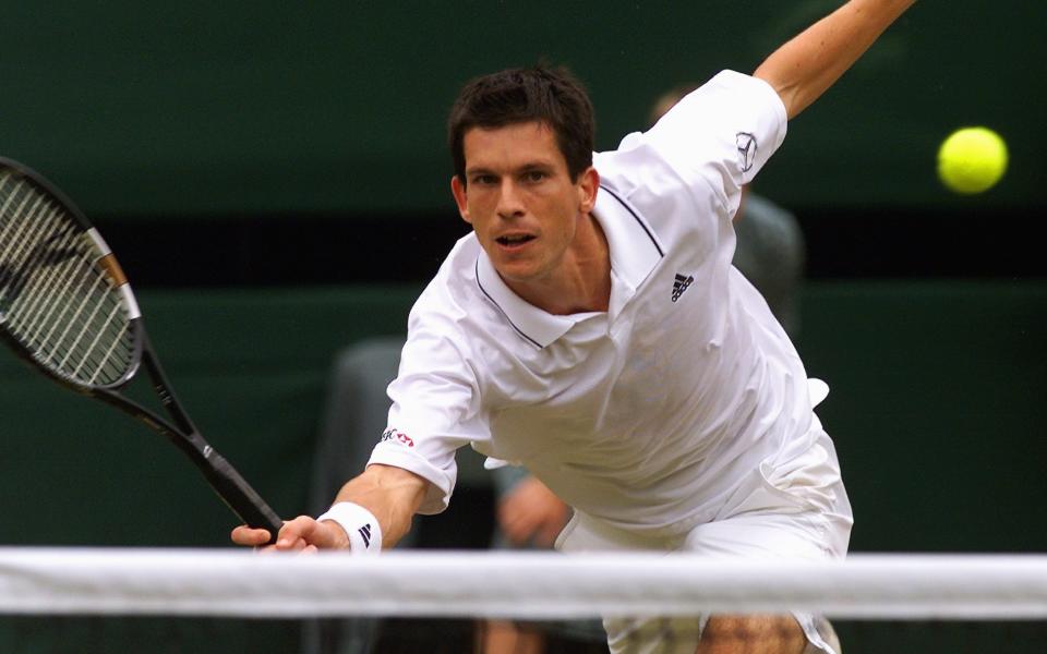 Tim Henman in action against Goran Ivanisevic at Wimbledon in 2001 - EPA