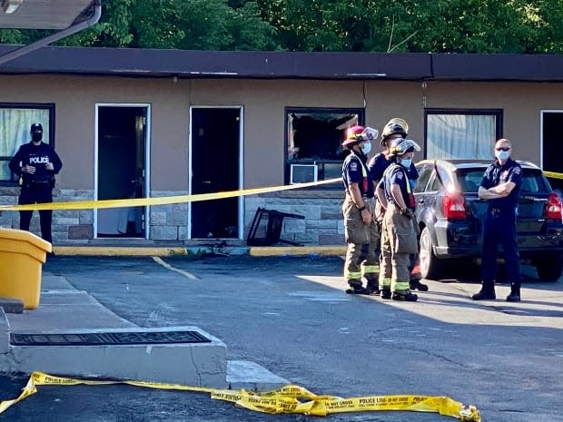 Toronto Police Services and Toronto Fire are investigating a fatal fire in a motel room in Scarborough on Monday morning, after a man in his 40s died of his injuries. (Martin Trainor/CBC - image credit)