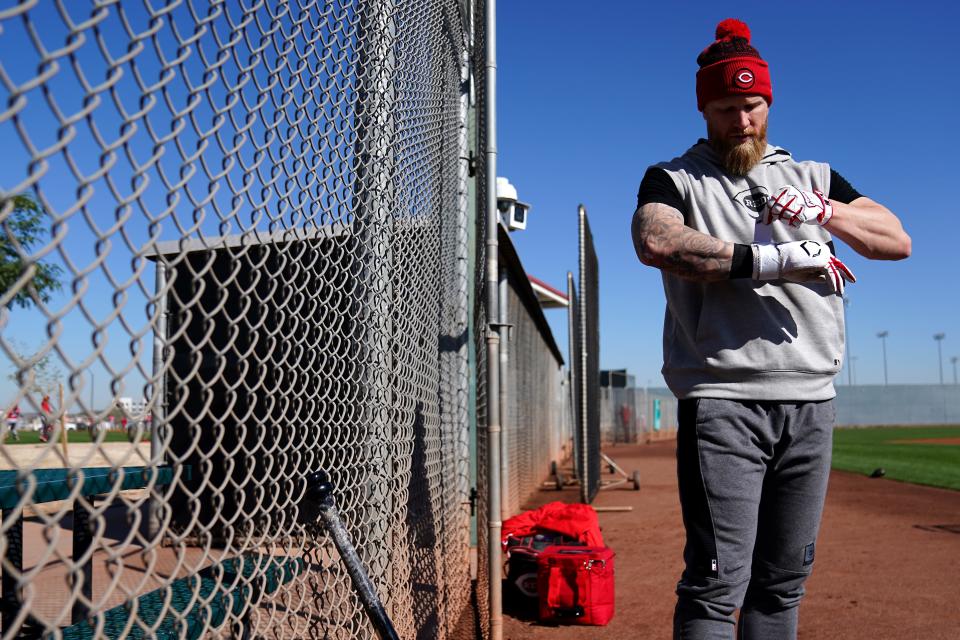 Cincinnati Reds right fielder Jake Fraley (27) prepares for batting practice during spring training workouts, Wednesday, Feb. 14, 2024, at the team’s spring training facility in Goodyear, Ariz.