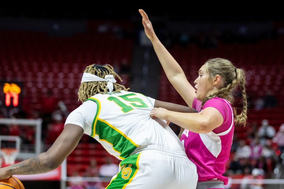 Utah Utes forward Samantha Crispe (44) posts up against Oregon Ducks center Phillipina Kyei (15) during a game at the Huntsman Center in Salt Lake City on Saturday, Feb. 11, 2023. | Marielle Scott, Deseret News