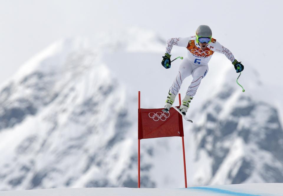 United States' Ted Ligety makes a jump during Men's super combined downhill training at the Sochi 2014 Winter Olympics, Tuesday, Feb. 11, 2014, in Krasnaya Polyana, Russia. (AP Photo/Luca Bruno)